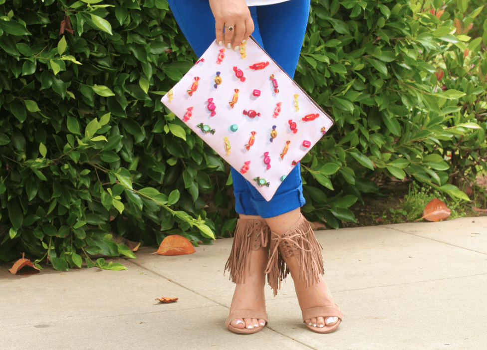 missyonmadison, melissa tierney, cobalt jeans, cobalt pants, tassel necklace, tassel beaded necklace, candy clutch, redbubble, redbubble clutch, candy printed clutch, fringe heels, tan fringe heels, fringe sandals, white topshop top, white chiffon cami, white chiffon camisole, how to wear cobalt, printed clutch, fringe heels, just fab, how to wear fringe heels, ray bans, blue aviators, blue ray bans, tassel trend, fringe trend, santa monica, la blogger, la, cali, california blogger, california, summer shoes, summer style, ootd, outfit inspo,