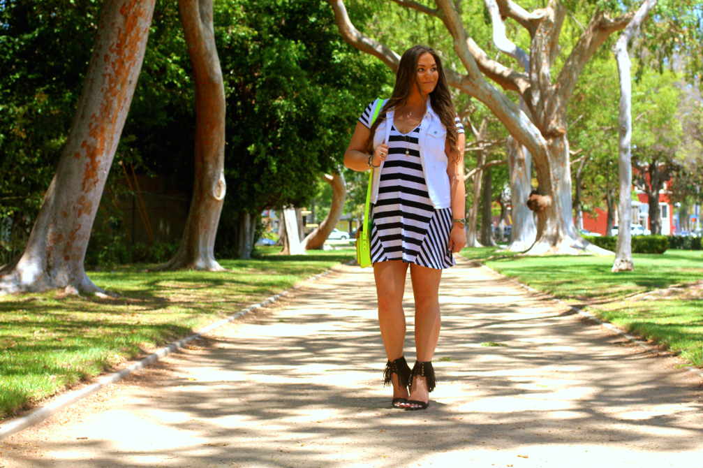 missyonmadison, melissa tierney, black and white striped dress, striped dress, lolly clothing, lolly clothing striped dress, fringe heels, just fab, just fab heels, just fab fringe heels, black fringe heels, fringe sandals, neon satchel, neon bag, cambridge satchel, neon cabridge satchel, poshmark, resale, designer sale, white denim vest, white vest, outfit inspo, beverly hills, photography, summer style, ootd, summer trends, fringe trend, how to wear stripes, how to wear fringe,