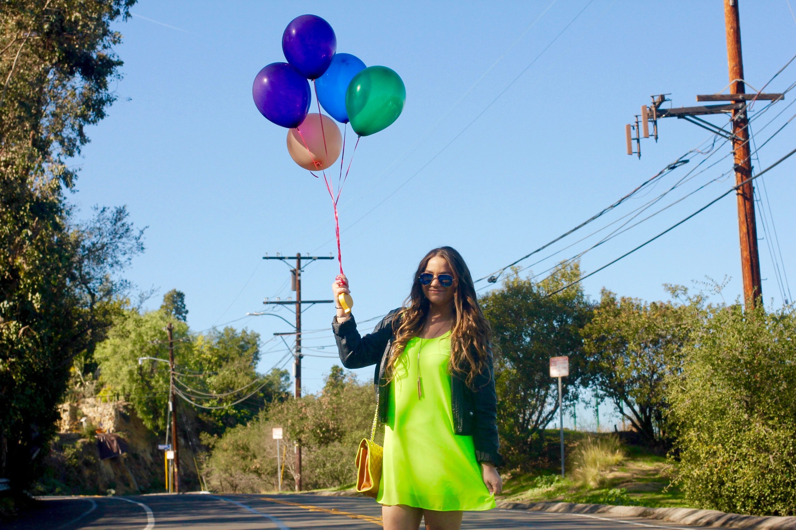 missyonmadison, melissa tierney, fashion blogger, fashion blogger, turning 24, birthday, birthday outfit, la blogger, neon dress, green neon dress, black moto jacket, leather jacket, leather motorcycle jacket, white pumps, white pointed toe pumps, brown quilted cross body bag, rebecca minkoff affair bag, tan quilted cross body bag, ray bans, blue mirrored ray bans, gold cuff bracelet, gold lariat necklace, universal city overlook, balloons, birthday girl, brunette hair,