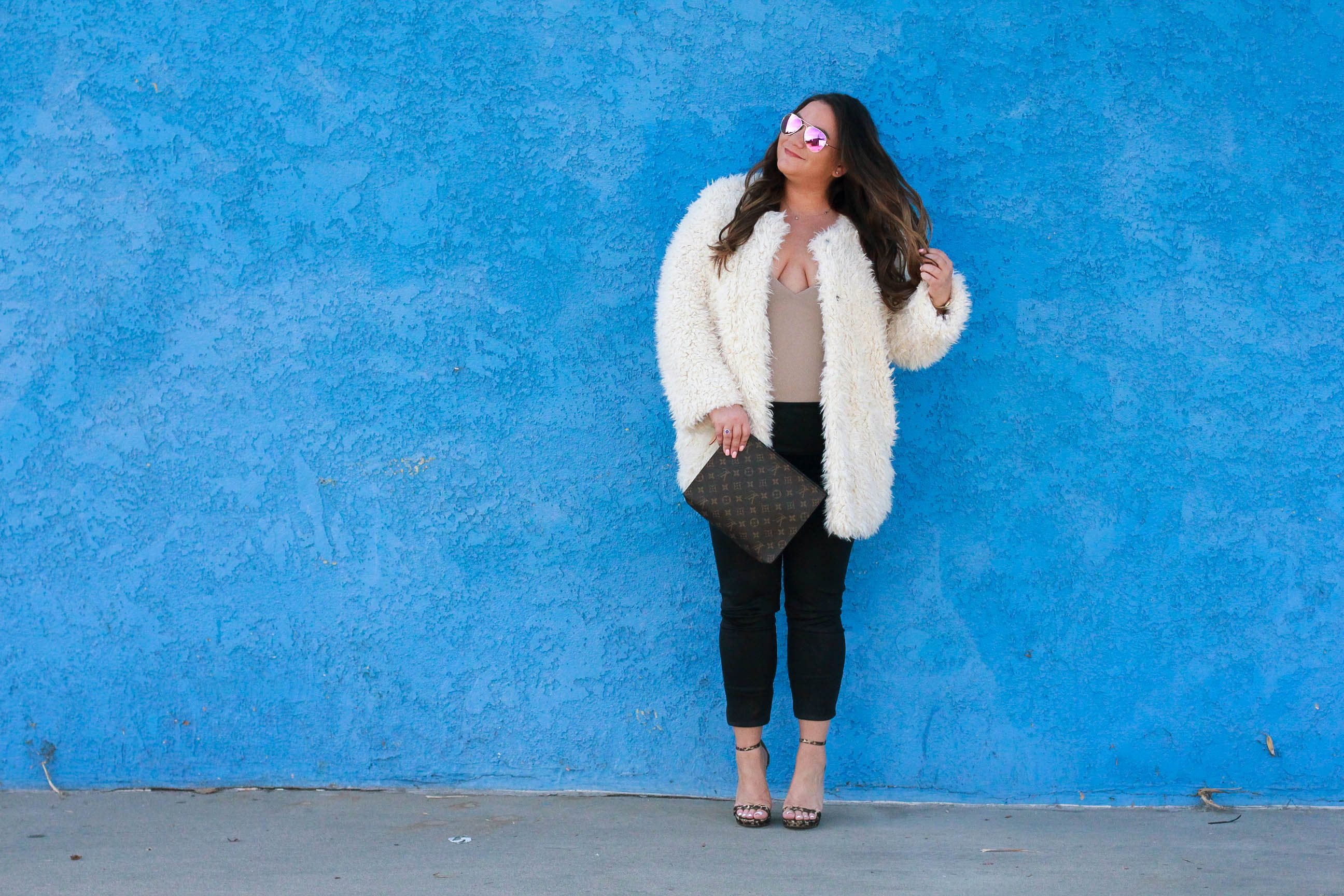 missyonmadison, missyonmadison blog, missyonmadison instagram, fashion blog, fashion blogger, white fuzzy coat, white coat, kendall and kylie coat, kendall and kylie fuzzy coat, leopard ankle strap sandals, leopard heels, leopard ankle strap heels, spanx, spanx leggings, spanx leather leggings, diff eyewear, diff eyewear pink aviators, pink aviators, bloglovin, la blogger, style blog, style blogger, melissa tierney, winter style, winter style inspo, winter outfit ideas, date night outfit, shaggy coat, fuzzy coat, teddy bear coat, v neck body suit, nude v neck body suit, louis vuitton clutch, louis vuitton toiletry pouch 26, louis vuitton toiletry pouch, style inspo,