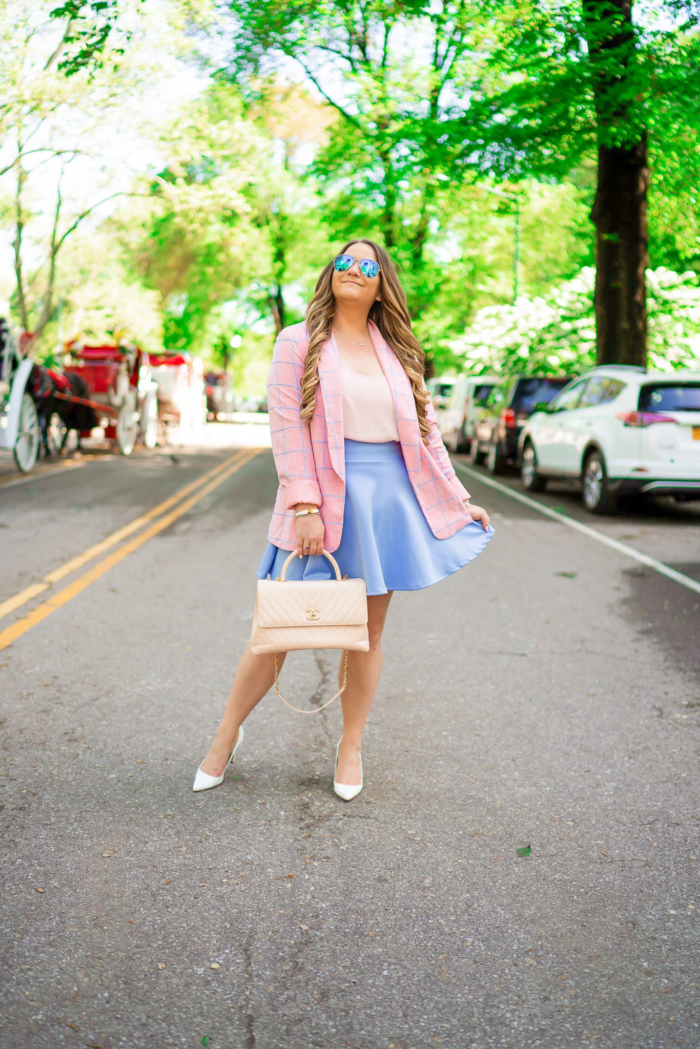 missyonmadison, missyonmadison blog, la blogger, missyonmadison instagram, currently wearing, style inspo, outfit inspo, outfit ideas, central park nyc, nyc blogger, travel blogger, checkered blazer, blue skater skirt, amazon fashion, white pumps, white pointed toe pumps, beige chanel bag, chanel top handle bag, pink chiffon camisole, chanel bag, hair extensions, nyc street style,