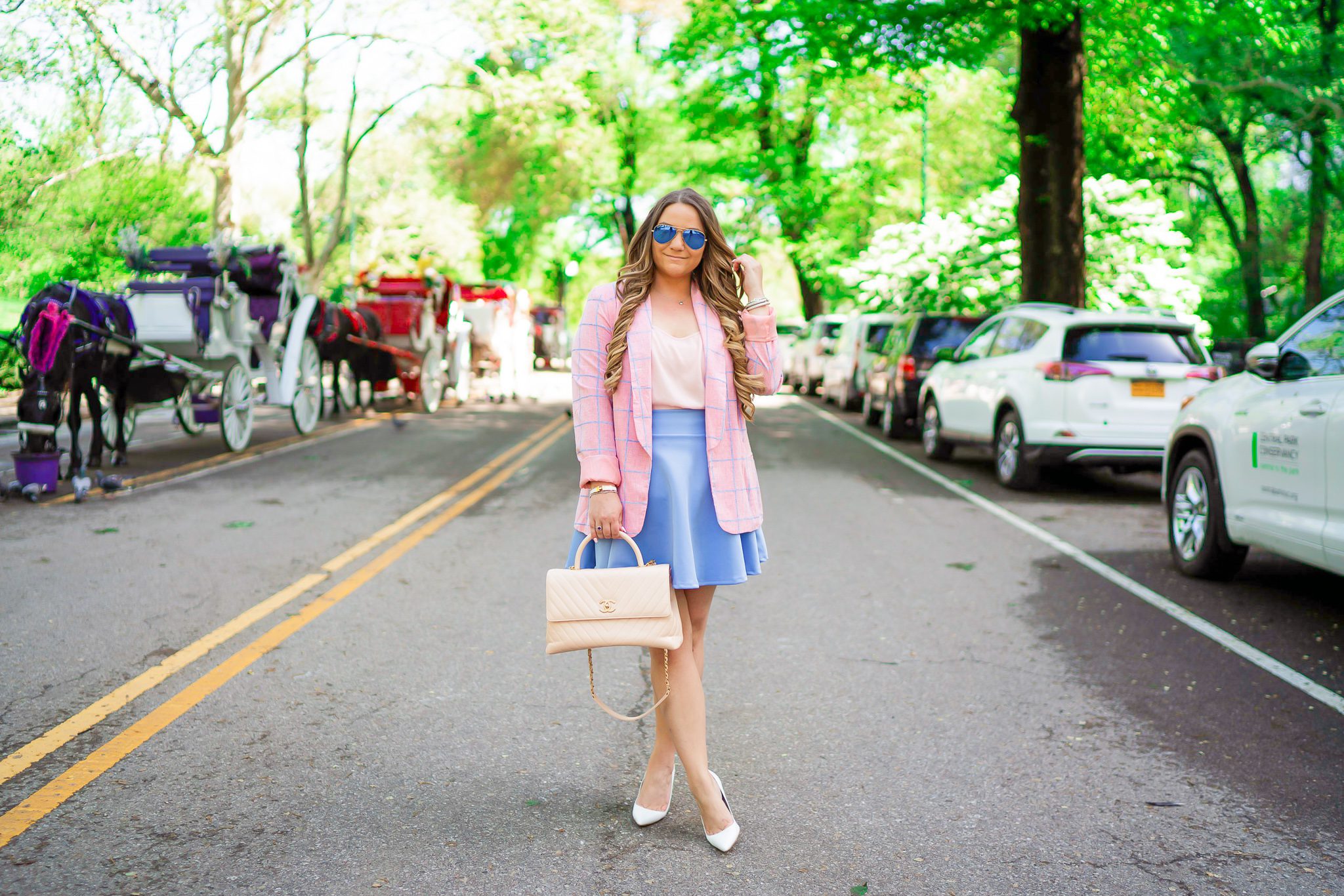 missyonmadison, missyonmadison blog, la blogger, missyonmadison instagram, currently wearing, style inspo, outfit inspo, outfit ideas, central park nyc, nyc blogger, travel blogger, checkered blazer, blue skater skirt, amazon fashion, white pumps, white pointed toe pumps, beige chanel bag, chanel top handle bag, pink chiffon camisole, chanel bag, hair extensions, nyc street style,